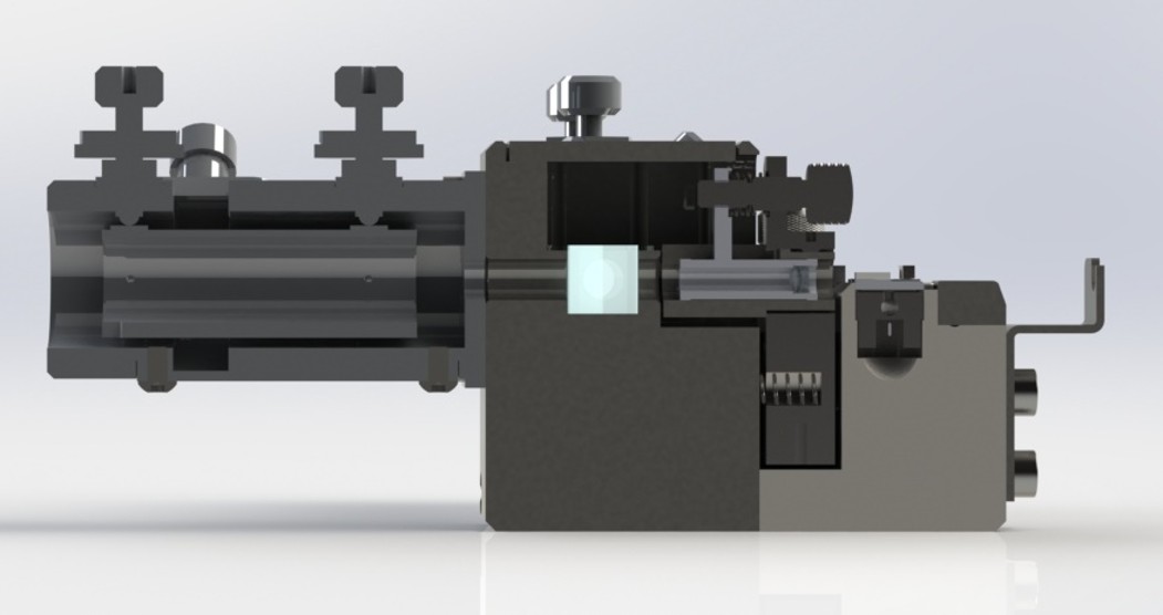 Sectioned view showing optical path, prism seat and adjusters